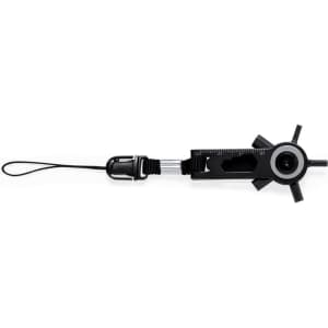 A black multitool keyring featuring various measuring tools and a loop for attachment, with a compass-like design.