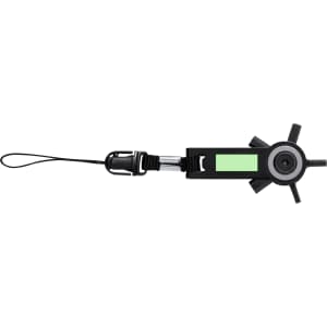 A black multitool with multiple functions, featuring a green accent and a clip for attaching to keyrings.