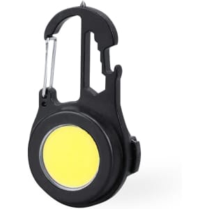 A black multitool with a circular yellow centre and a carabiner clip. It features various tools integrated into the design.