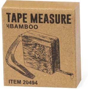 A bamboo tape measure in a cardboard box, featuring an attached strap and a printed design.