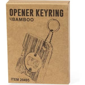 A brown gift box containing a bamboo keyring with a bottle opener feature and a keychain attachment.