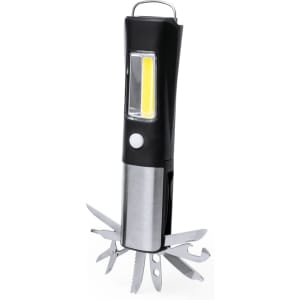 A black and silver multitool with multiple metal attachments and a built-in light, featuring a branding logo.