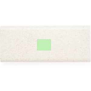A light beige tool set with a green section, featuring various tools and a logo.