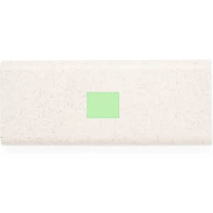 A light grey tool set with a rectangular shape, featuring a small green area, and includes a logo.