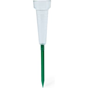 A clear plastic rain meter with a green stake for outdoor use, marked with measurement lines.