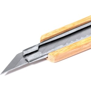 A utility cutter with a metal blade and wooden handle, featuring a sleek design for easy grip.