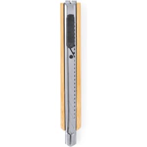 A silver cutting tool with a wooden handle, featuring a retractable blade and a textured grip.