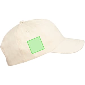 A beige cap featuring a green square-shaped area on the side and a logo on the front.