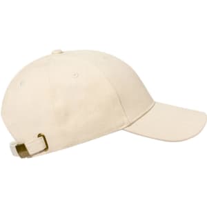 A beige cap with a curved brim, adjustable strap, and eyelet vents, featuring a small logo.