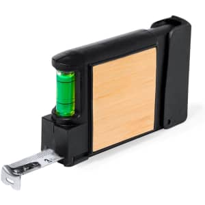 A 3m multitool tape measure with a black casing and a green bubble level, featuring a wooden panel.