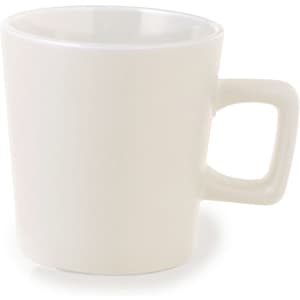 A white coffee mug with a unique handle design and a smooth, glossy finish. It has a simple, modern look.