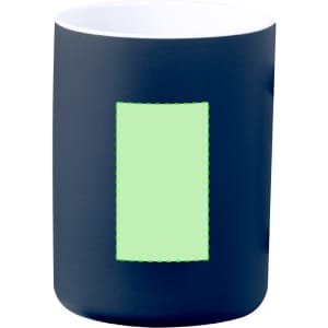 A coffee mug in navy blue with a white interior and a rectangular area for branding.