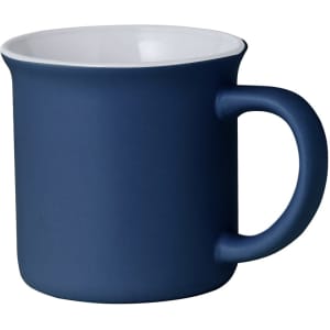 A navy blue coffee mug with a smooth matte finish and a contrasting white interior. It features a rounded handle and a simple design.