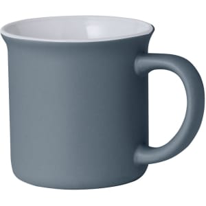 A coffee mug in a dark grey matte finish with a smooth white interior and a sturdy handle.