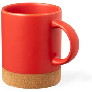 A red coffee mug with a cork bottom and a rounded handle, featuring a smooth finish and a logo.