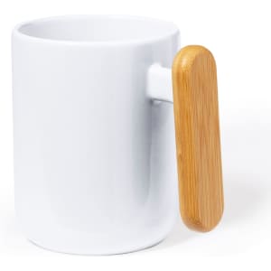A coffee mug in white ceramic with a bamboo handle, featuring a sleek and modern design.
