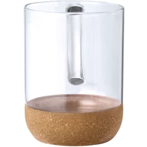A glass mug featuring a cork base and a clear body. It has a minimalist design.