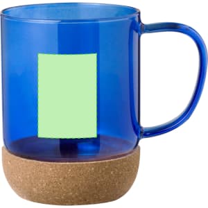A blue glass mug with a cork base, featuring a smooth handle and an empty space for branding.