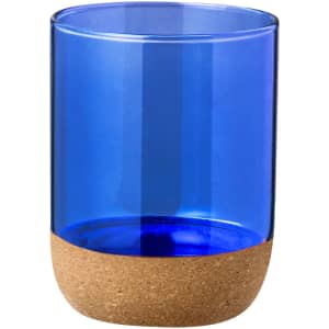 A drink cup in blue glass with a cork base, featuring a logo. Ideal for outdoor use.
