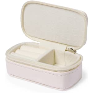 A light pink jewellery wrap with a zip closure and soft interior, featuring compartments for accessories.