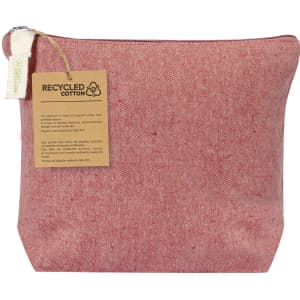 A red toiletry bag made from recycled cotton, featuring a zipper closure and a tag with care instructions.