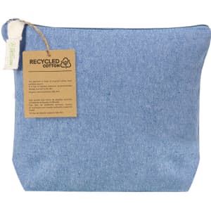 A blue toiletry bag made from recycled cotton, featuring a small tag with information about the material.
