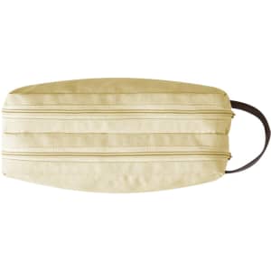 A pale yellow toiletry bag with a smooth surface and a brown handle, featuring two zippered compartments.