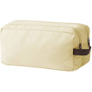 A rectangular toiletry bag in a light yellow hue with a brown handle and a double zipper closure.