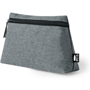 A grey toiletry bag with a zip closure and a small branding label on the side.