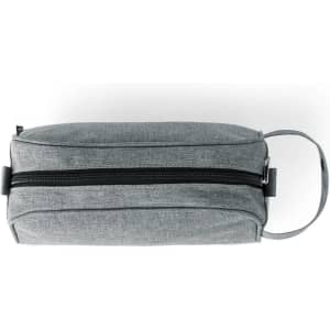 A grey toiletry bag with a zip closure and a side handle, featuring a subtle branding logo.