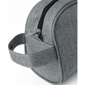 A grey toiletry bag with a zip closure and a side handle. It has a simple and stylish design.