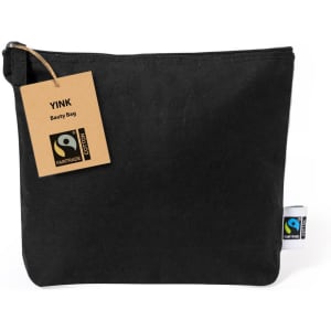 A black toiletry bag made of cotton with a zip closure and a tag. Features a Fairtrade logo.