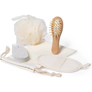 A beige bathroom set including a loofah, hairbrush, sponge, and two cloths, all featuring natural materials.