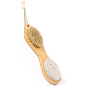 A Cierny exfoliating massage brush featuring a bamboo handle, natural bristles, and a pumice stone, tied with a rope.