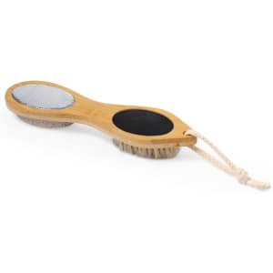 An exfoliating massage brush featuring a bamboo handle, with textured surfaces in grey and black, and a hanging rope.