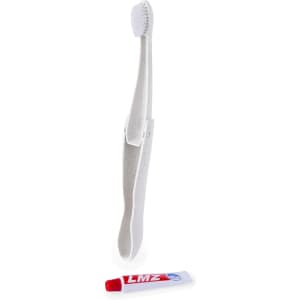 A white toothbrush and a red tube of toothpaste, both displayed against a plain background. The toothbrush features a logo.