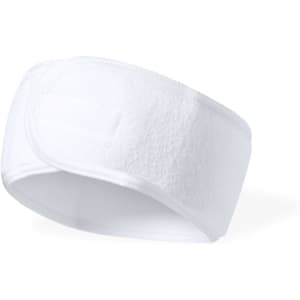 A white headband with a textured surface, featuring a logo on one side.