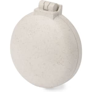 A round, white hairbrush with an integrated mirror and a simple clasp design, featuring a subtle textured surface.