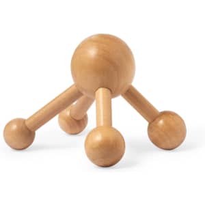 A wooden massager featuring three rounded ends and a central ball, designed for personal health use.
