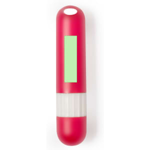 A pink lip balm container with a white base and a blank area for custom branding.