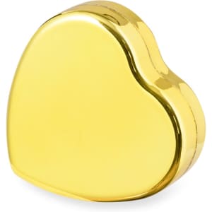 A heart-shaped lip balm container in a shiny gold finish, featuring a logo on the front.