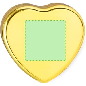 A golden heart-shaped tin with a smooth surface, featuring a blank green square in the centre.