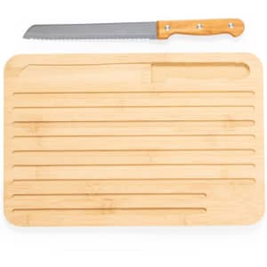 A bamboo cutting board with grooves and a knife featuring a wooden handle resting beside it.