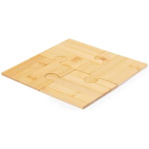 A bamboo coaster set with a puzzle piece design, featuring natural wood tones and smooth edges.