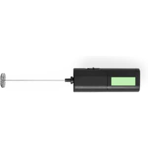 A black milk frother with a metal whisk attachment, featuring a simple design and a green accent.