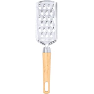 A stainless steel grater with a wooden handle, featuring multiple holes for grating. Includes a logo on the handle.