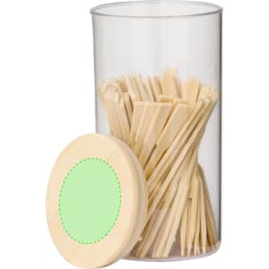 A clear container filled with bamboo chopsticks, topped with a wooden lid. The chopsticks are light in colour.