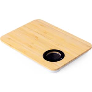 A wooden chopping board with a built-in digital weighing scale. It features a circular display area.