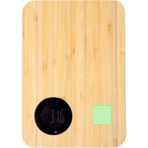 A bamboo kitchen cutting board with a digital display scale in black and a green square section.