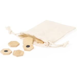 A set of wooden hexagonal magnets in a beige drawstring pouch, featuring a black circle on each piece.